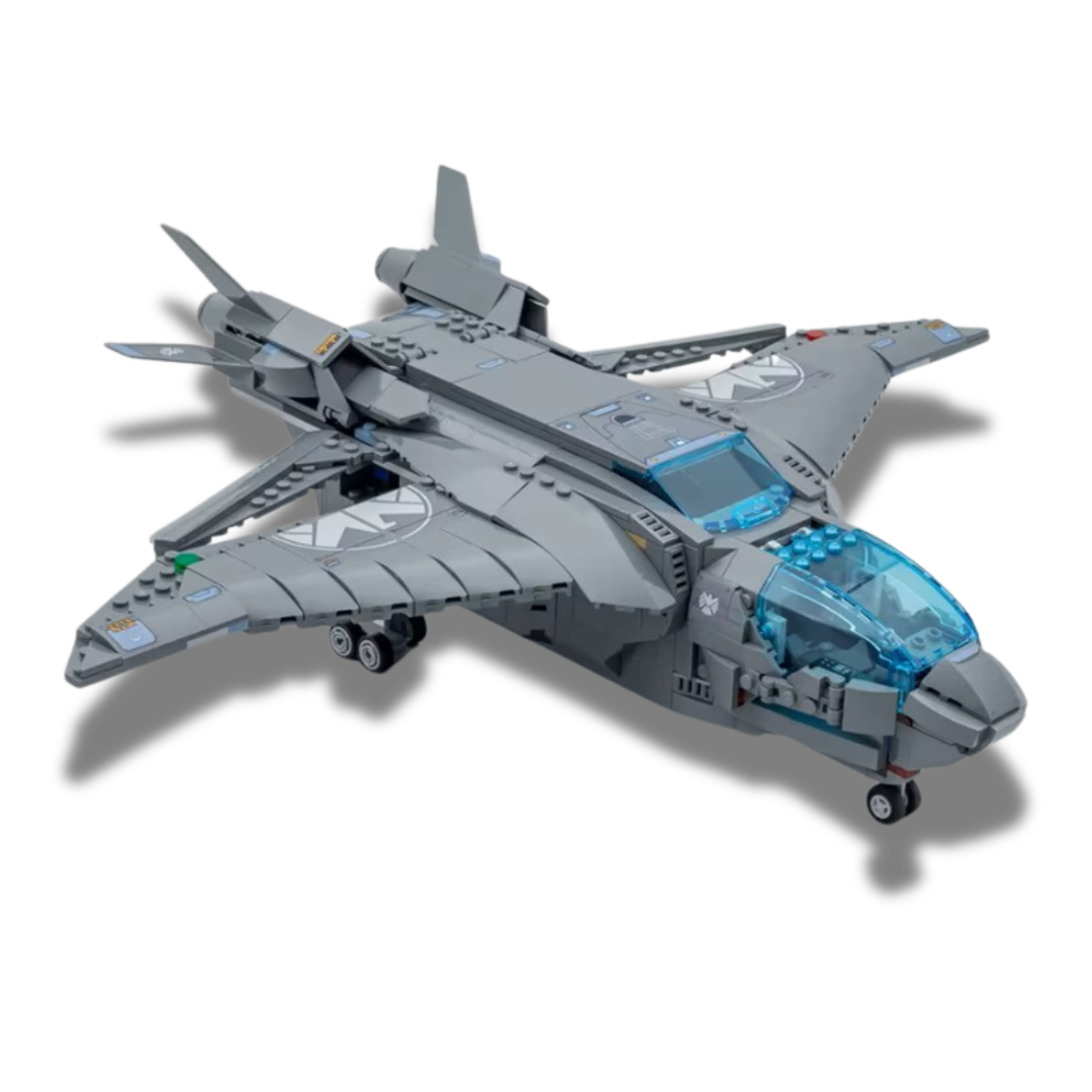 Brick-built Marvel Avengers Quinjet model in gray with a transparent blue cockpit, adjustable wings, retractable landing gear, and S.H.I.E.L.D. insignias