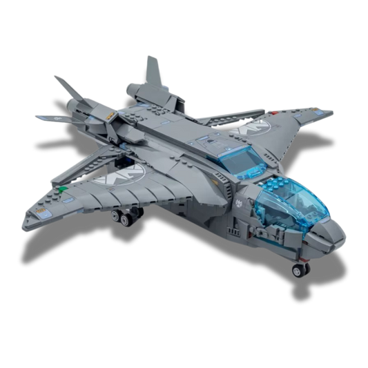 Brick-built Marvel Avengers Quinjet model in gray with a transparent blue cockpit, adjustable wings, retractable landing gear, and S.H.I.E.L.D. insignias