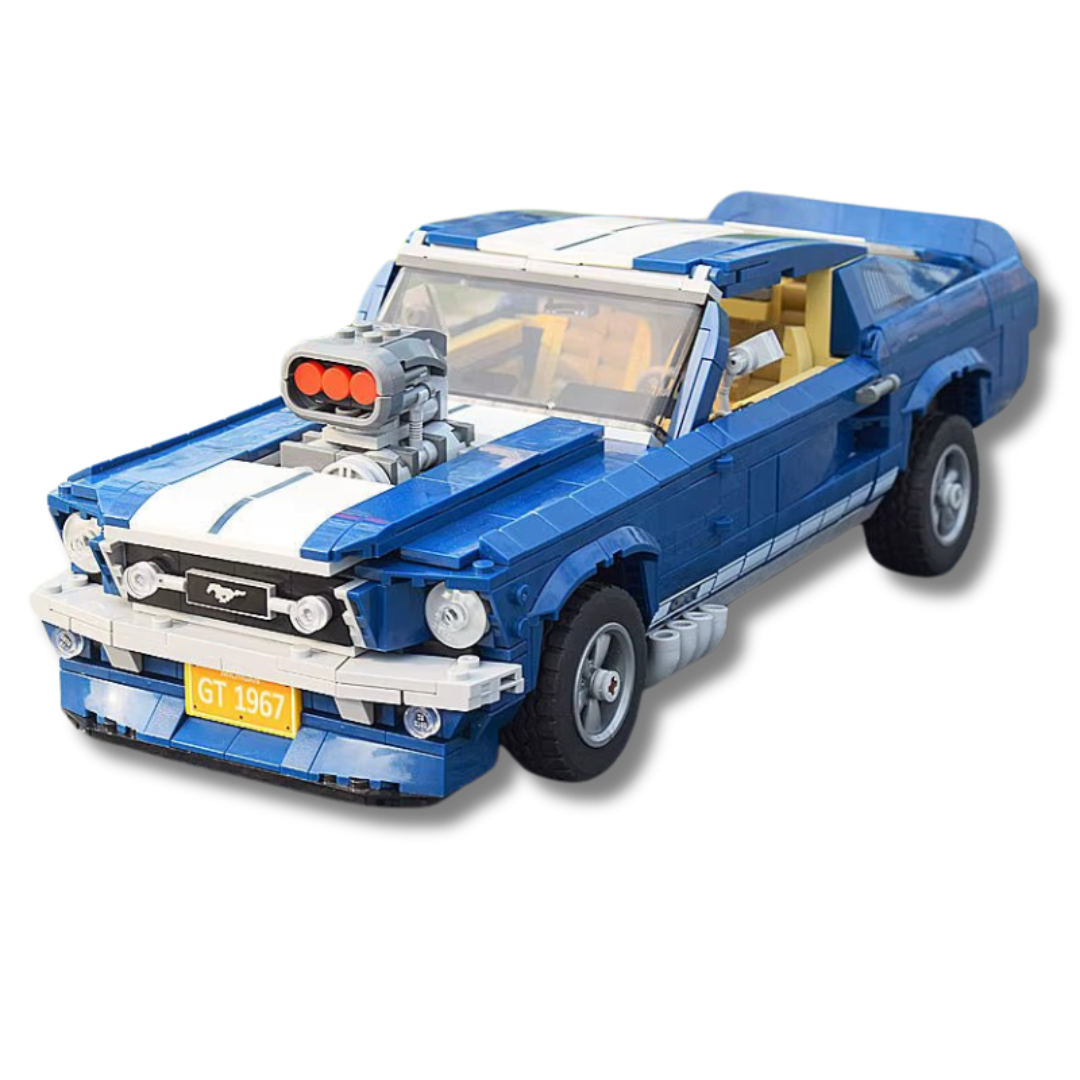 lego alternate builds 1960s Ford Mustang model with a supercharger, white racing stripes, GT 1967 license plate, and realistic details, displayed on a paved outdoor surface with grass in the background.